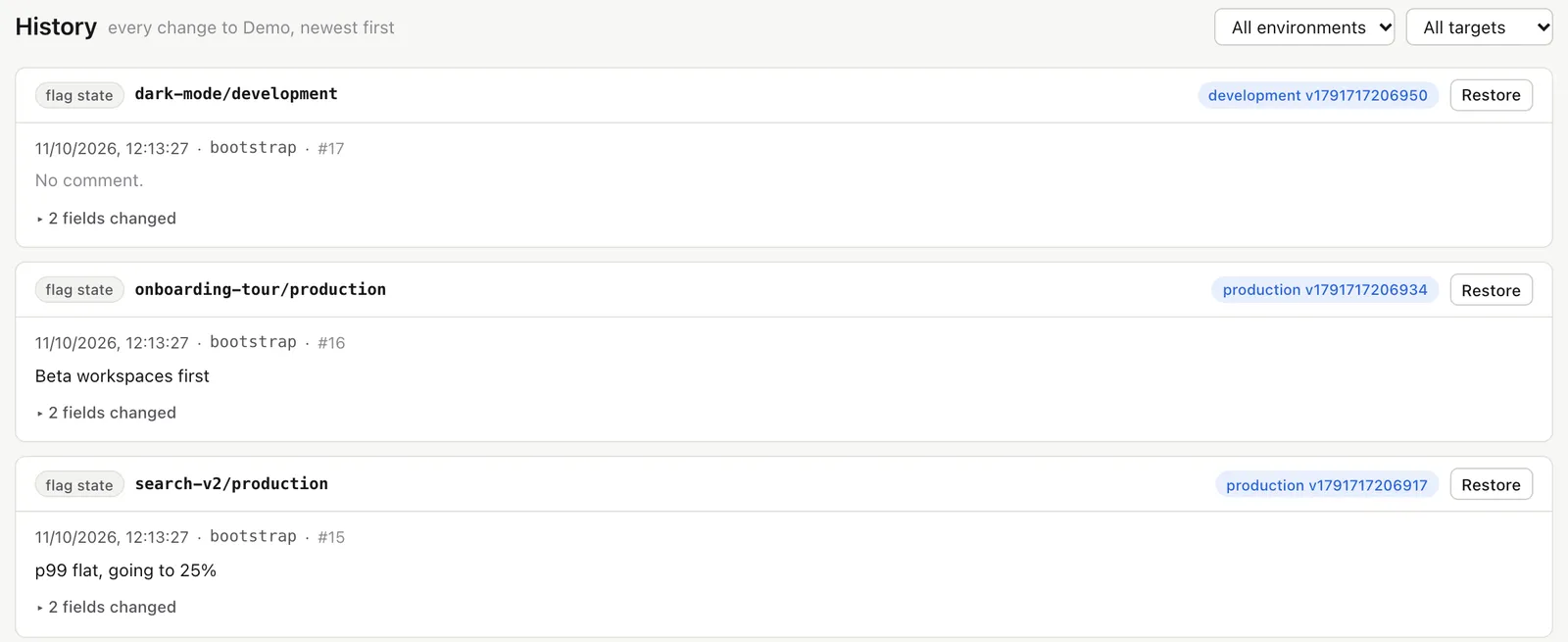 The project history: each change with its flag, environment, author, comment and a Restore button.